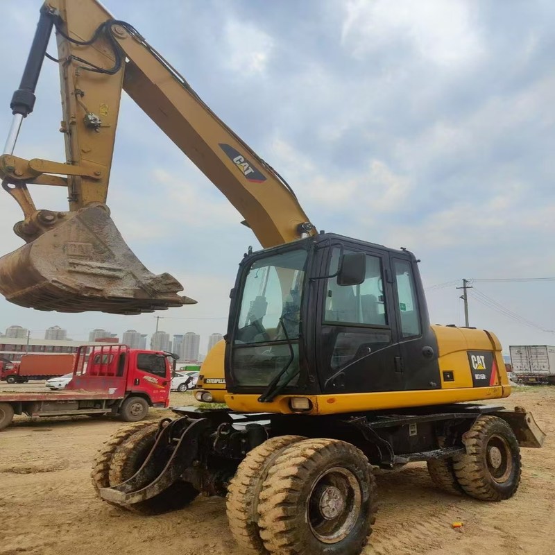 Le chat original M315D d'excavatrice d'occasion a utilisé une pelle sur pneus de 15 tonnes avec un godet de 0,61 m3